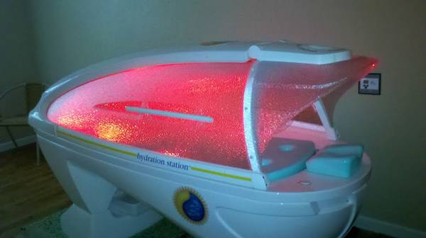 red light therapy in a spa capsule